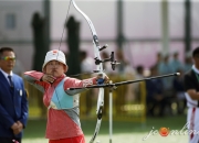 米兰,-弓如满月，运动员射中目标！